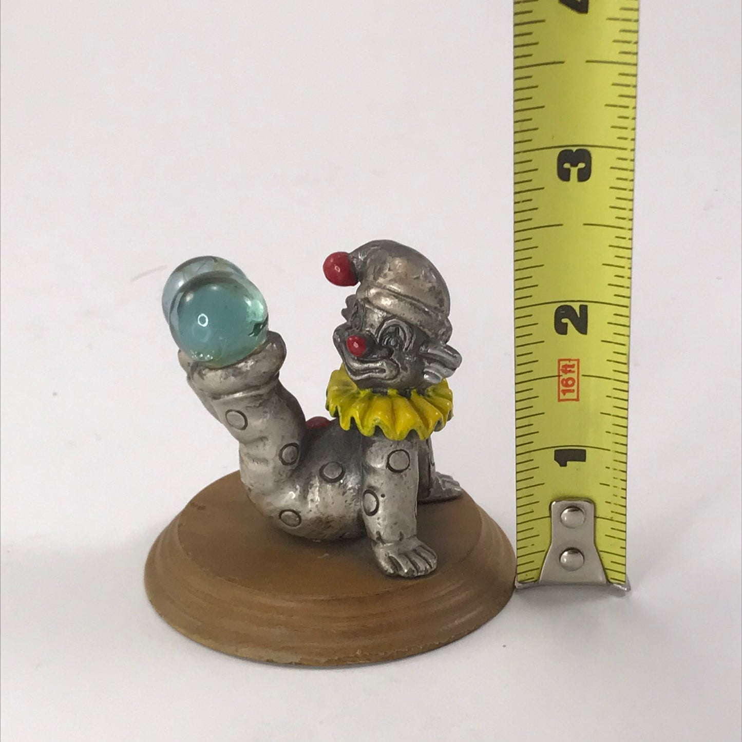 George Good Pewter Clown Sitting and Balancing Glass Balls