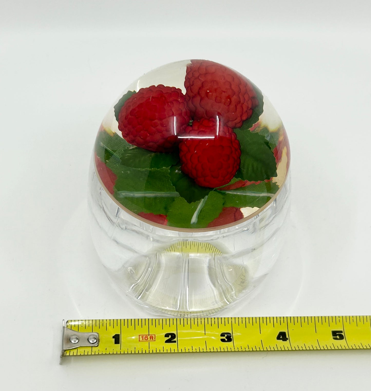 Rasberries encased in an Acrylic Jam Jar