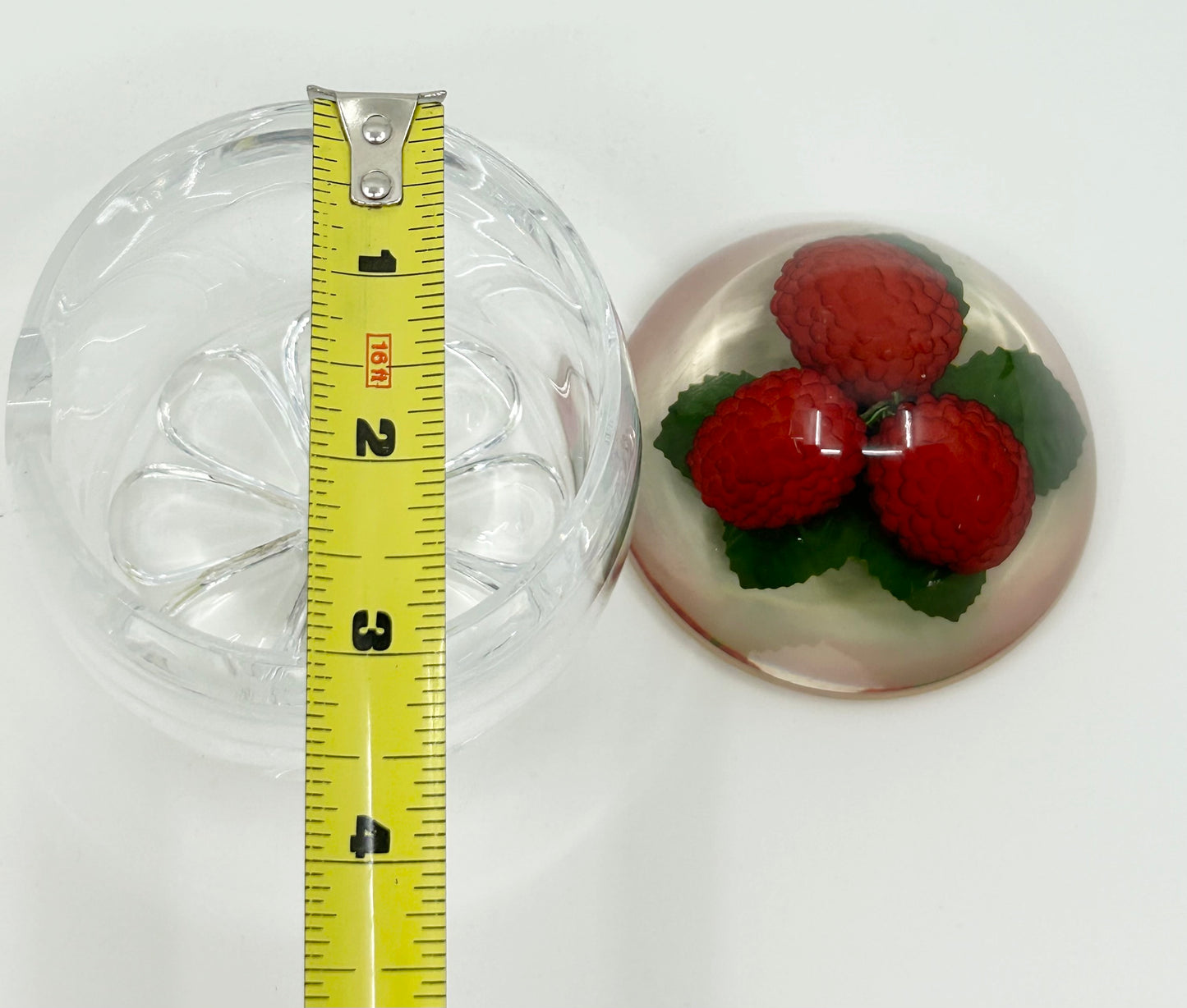 Rasberries encased in an Acrylic Jam Jar