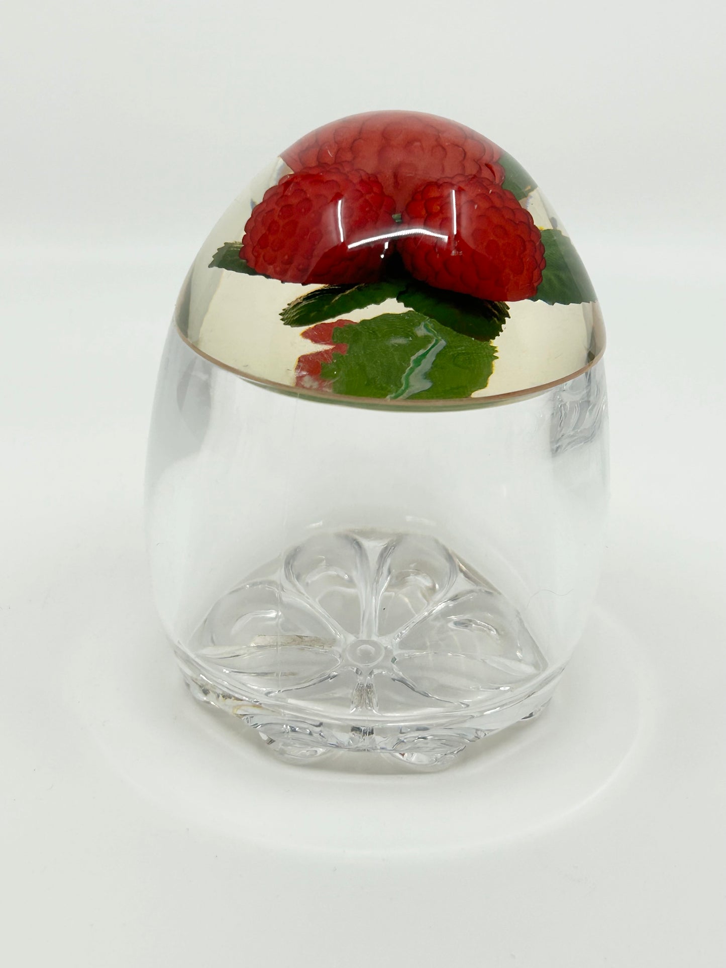 Rasberries encased in an Acrylic Jam Jar