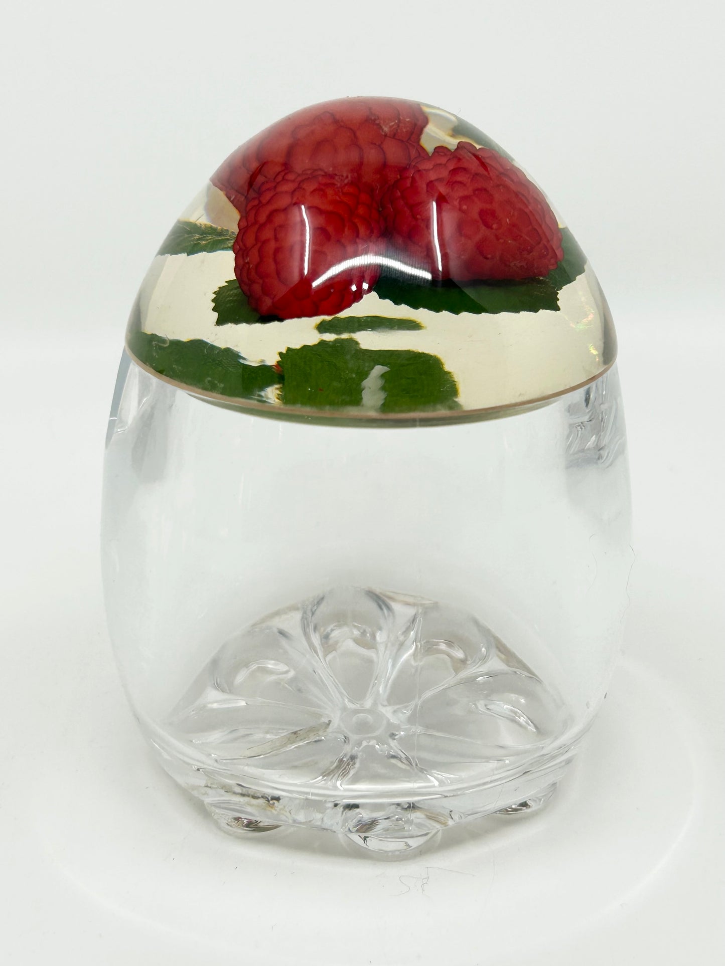 Rasberries encased in an Acrylic Jam Jar